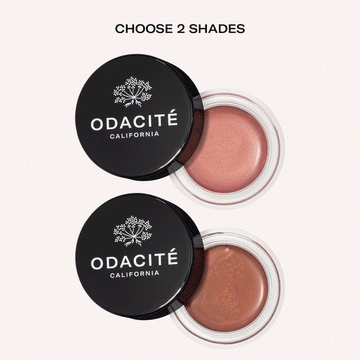 Two open jars of Odacité SPF 50 Color Balm Duo in two shades, with 