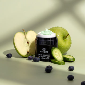 Odacité Green Smoothie® Crème with cucumber and hyaluronic acid in a jar, shown on a light green background.