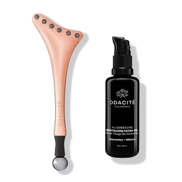 Odacité Ice-Lift Facial Cryotherapy Duo and All-Embracing Revitalizing Oil bottles on a plain white background.