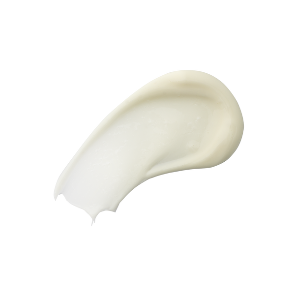 A smear of Odacité Intense Repair Eye Cream Refill Edelweiss Extrême with Peptides and Carnosine on a white background.