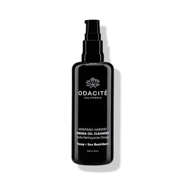 Odacité Double Cleansing Set with Omega Oil and Clarifying Cleansers shown in clear bottles, set on a plain background.