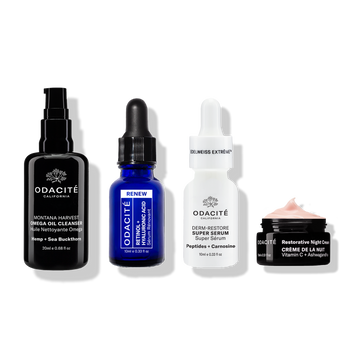 Four Odacité Age-Defying Fundamentals with Vitamin C: cleanser, serum, super serum, and night cream on a white background.