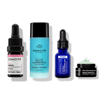 Odacité Blemish Control System with serum, micellar water, blue salicylic serum, and green cream in distinct containers.