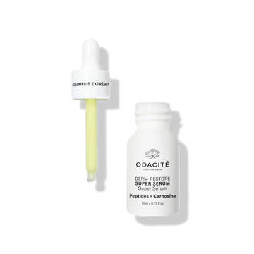 Odacité Derm-Restore Super Serum in open white bottle with yellow serum dropper, labeled Edelweiss Extrême®, on white background.