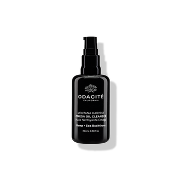 Black Odacite Montana Harvest Omega Oil Cleanser with pump, hemp and sea buckthorn graphics, on a white background.