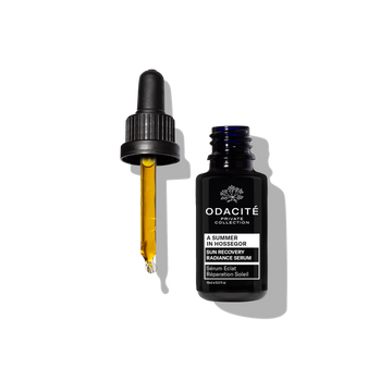 Odacite Corrective Repair Serum • A Summer in Hossegor shown as a golden liquid in a clear dropper bottle.