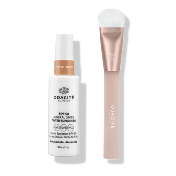Odacité SPF Tinted Mineral Drops & Brush Duo, with a rose-gold and white brush, displayed on a white background.
