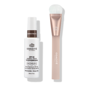 Odacité SPF Tinted Mineral Drops & Brush Duo with color-adapting SPF 50 drops and a rose gold handle brush with white bristles.