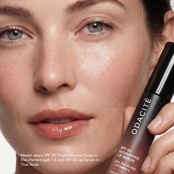 Woman with glowing, dewy skin holds Odacité Glow More + Age Less Duo; bottom left features on-screen text.