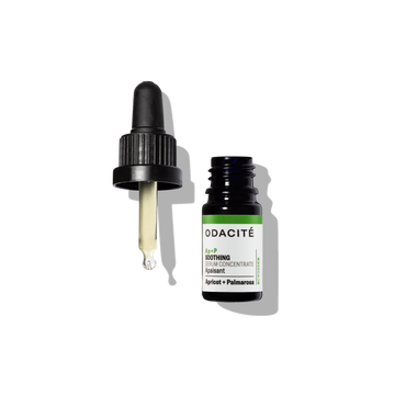 Green Odacite Soothing Apricot + Palmarosa Ap+P Serum Concentrate bottle for sensitive skin on a white background.