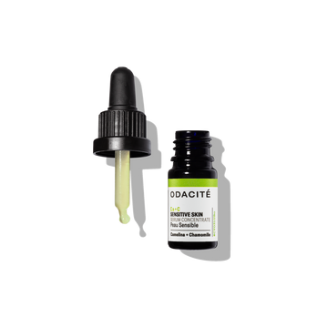 Odacite Ca+C Serum Concentrate in clear bottle with dropper, labeled Camelina + Chamomile for sensitive skin.