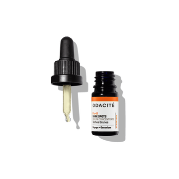 Odacite Dark Spots Papaya + Geranium Pa+G Serum Concentrate bottle with dropper off, set on a white background.