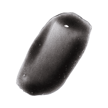Odacite Black Mint Charcoal + Rhassoul Clarifying Cleanser gel with bubbles on a plain white background.