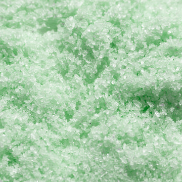 Odacite Energy Awakening Himalayan Bath Soak with visible crystal salt, rosemary, and eucalyptus in clear packaging.