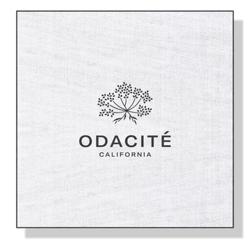 Odacité tree logo above “Odacité CALIFORNIA” on a white textured background, shown with the Odacité Muslin Cloth.