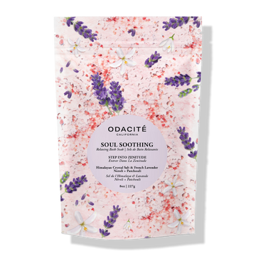 Odacite Relax & Recenter Bath Set in a lavender pouch with pink floral pattern, shown closed and ready for use.