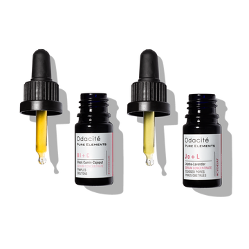 Three Odacité Clear + Decongest Pimple-Prone Duo bottles with droppers arranged on a plain white background.