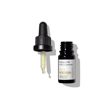 Odacite Brighten + Balance Uneven Skin Duo serum in a small glass bottle with a black dropper cap.