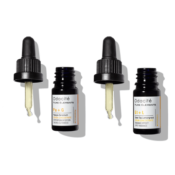 Odacite Brighten + Balance Uneven Skin Duo glass bottles with droppers off, shown on a plain white background.